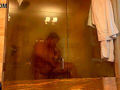 Mistress Danie enjoys a hot shower in PCB