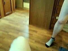 A mature wife gives a POV blowjob while I watch TV and drink coffee
