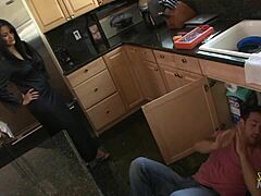 Horny milf seduces plumber in kitchen for sex
